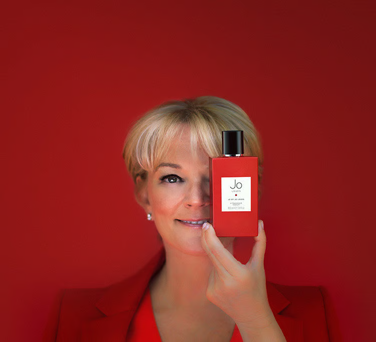Jo Malone with her perfume 'Jo Loves' 